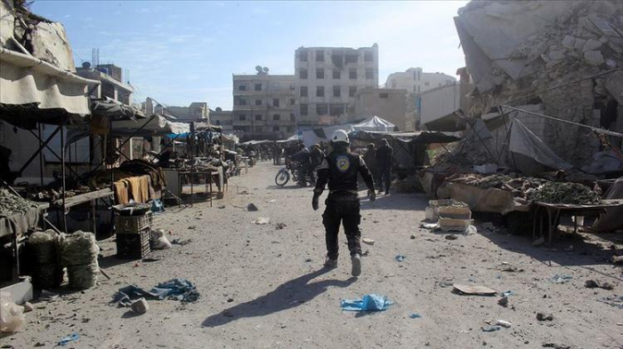 Əsəd ordusu bazarı bombaladı:   4 ölü, 40 yaralı     
