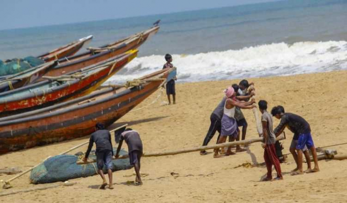 India launches mass evacuation, warns tourists, as cyclone bears down on east coast  