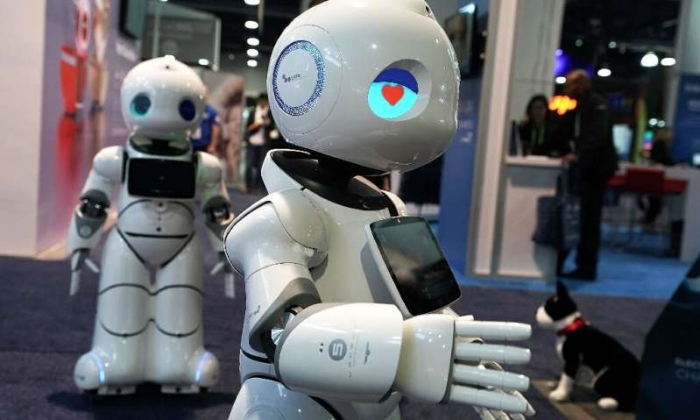 Robots to take 20 mn jobs, worsening inequality: study
 