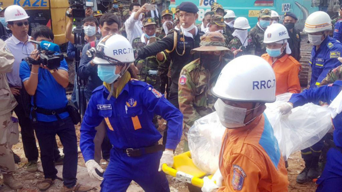 Cambodia building collapse: 2 people found alive in rubble; at least 28 dead