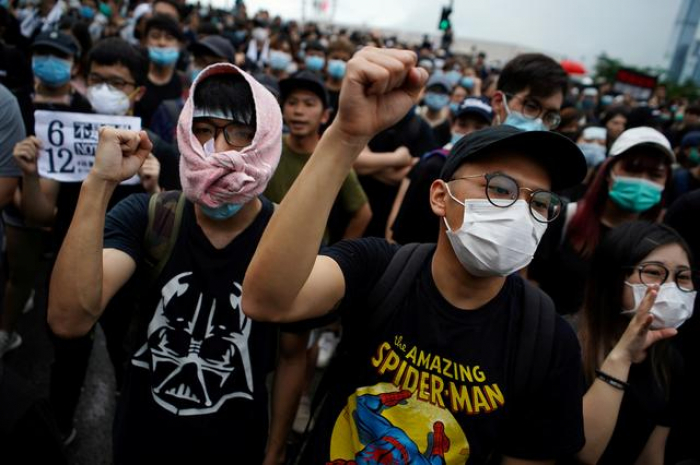 Activists in Hong Kong make pitch to extradition protesters: register to vote  