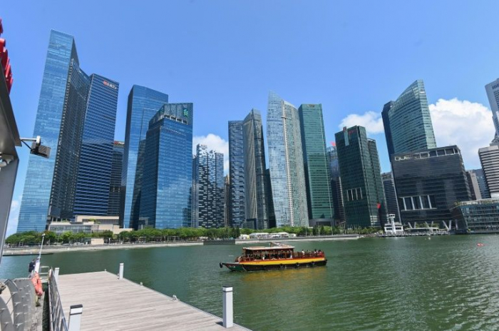 Singapore economy shrinks in warning for global trade  