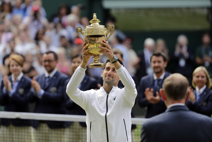 Djokovic beats Federer in longest Wimbledon singles final