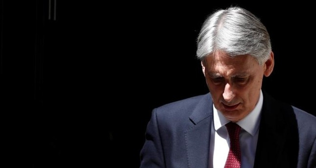 UK Finance Minister Hammond says will resign if Johnson becomes PM