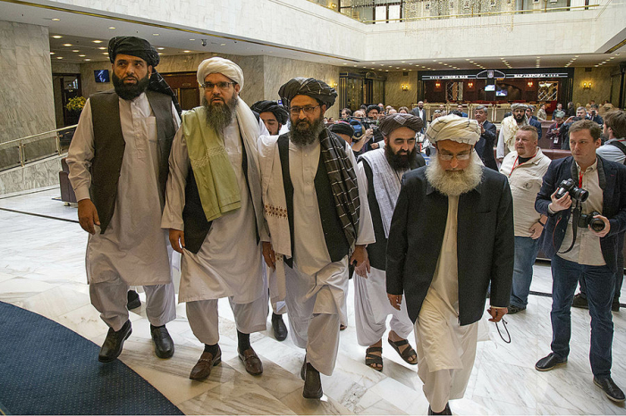 Afghans, Taliban talk in Qatar about a peaceful future as war rages at home