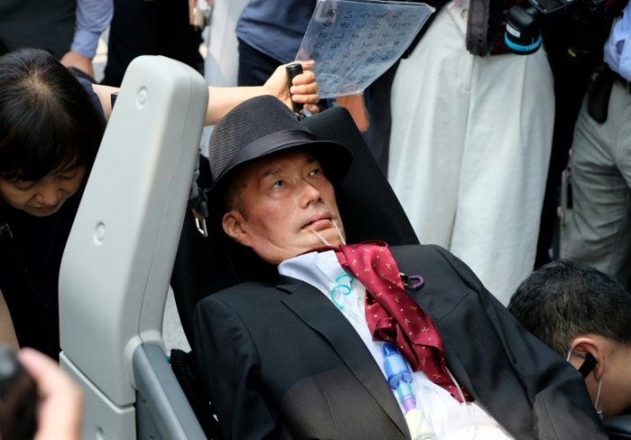 Lawmakers with serious disabilities take seats in Japan parliament