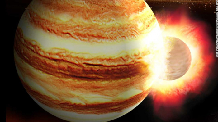  When Jupiter was young, a massive planet likely slammed into it  