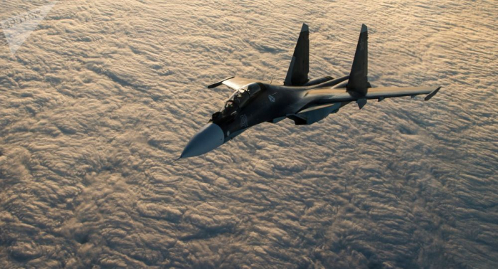 كيف سينتهي تصادم "سو-30" بـ "إف-22" فوق سوريا