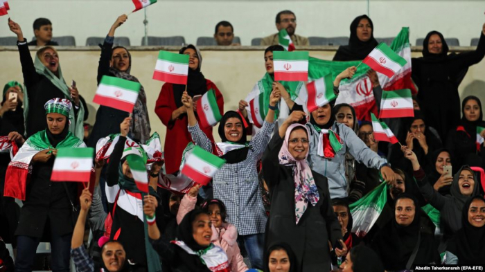 Iran to let women attend Men