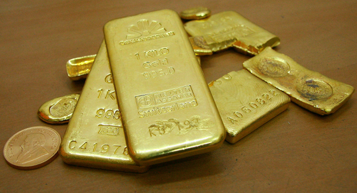 الذهب يتراجع مع تعزيز آمال التجارة لشهية المخاطرة