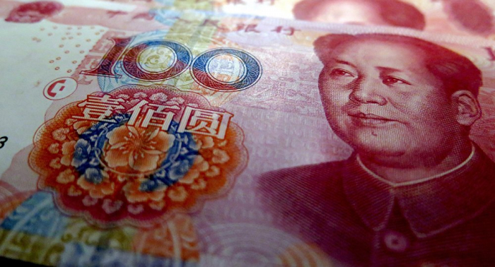   China devalúa el yuan hasta niveles de marzo de 2008  