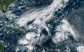 Tropical storms inch toward Puerto Rico, Bermuda