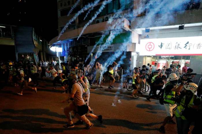Hong Kong riot police move to curb airport protest after violent clashes