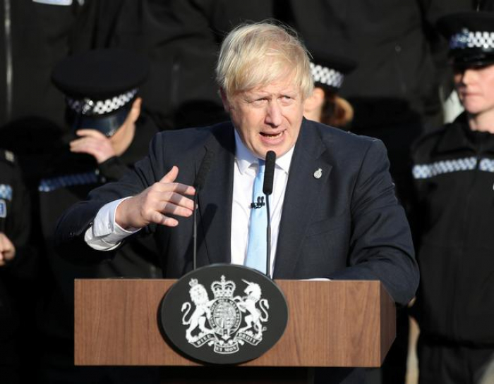 British PM Johnson visits Scotland as electioneering begins early  