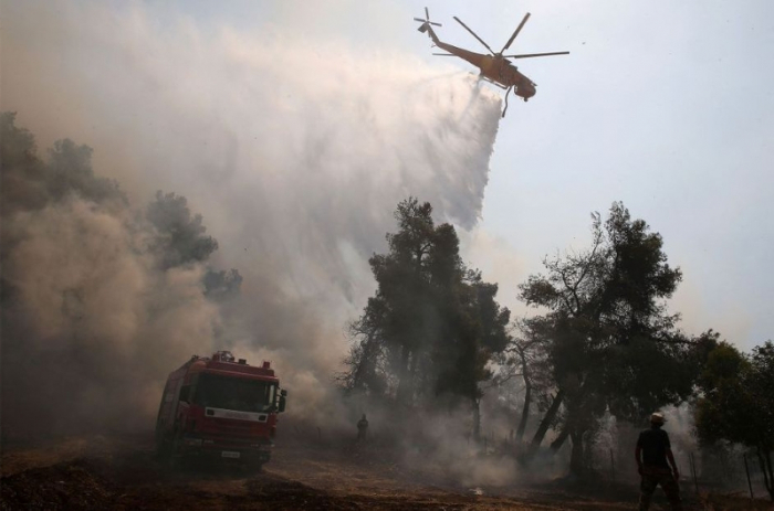   Grèce:   important feu de forêt à une soixantaine de km d