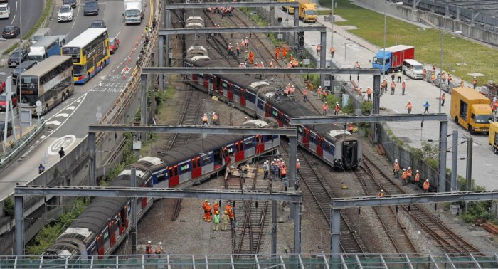 At least 8 people injured as subway train derails in Hong Kong during rush hour