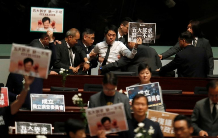 Hong Kong legislature suspended amid chaos over protests  