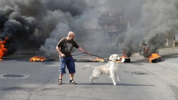 Lebanon scraps WhatsApp tax as protests rage