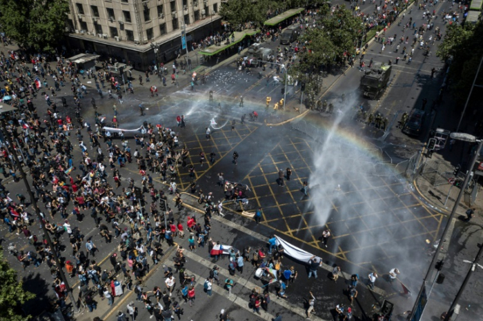 Thousands of Chileans strike as protest death toll hits 18