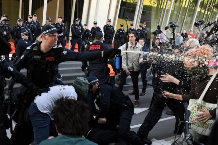 Dozens arrested as Australia mining protest turns violent  