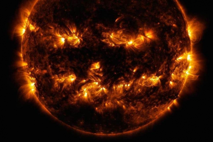  Nasa shares remarkable  photo  of sun looking like a jack-o
