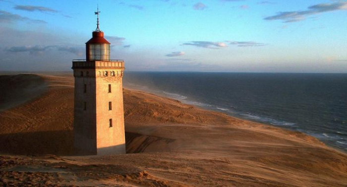 Denmark moves 720-tonne lighthouse to save it from falling into sea