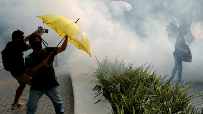 Hong Kong police fire tear gas in latest round of protests
