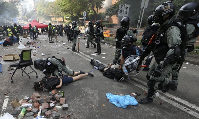   Hong Kong protests: hundreds arrested as university standoff enters third day  