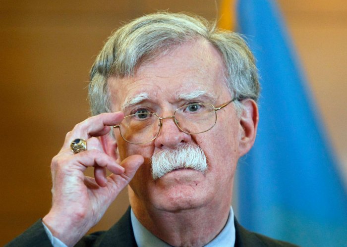 Bolton posts tweet implying White House trying to silence him