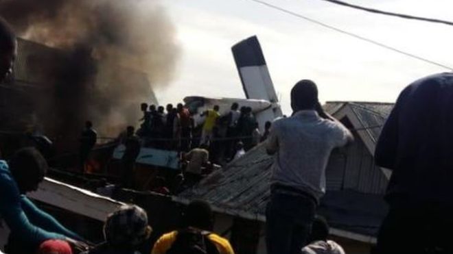 DR Congo plane carrying 18 people crashes into homes