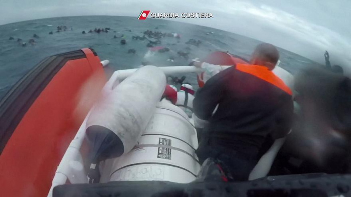   Shocking footage shows girl rescued by divers off Italian coast-  NO COMMENT    