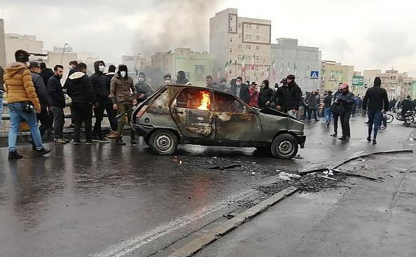  Amnesty International:  More than 100 protesters killed  in Iran unrest 