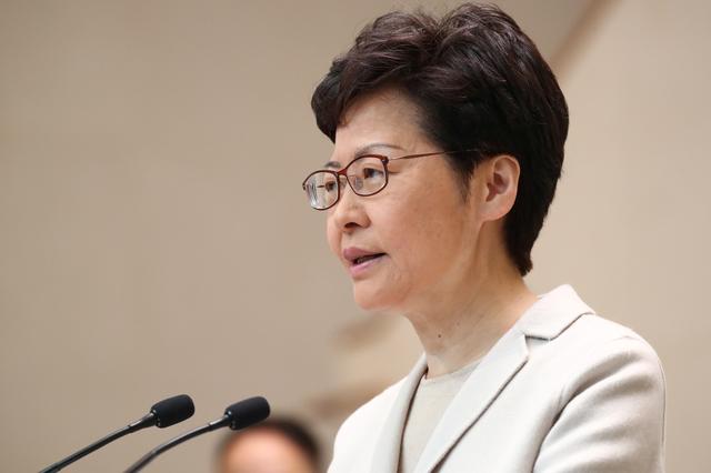 Hong Kong leader Lam visits Beijing as pressure mounts at home