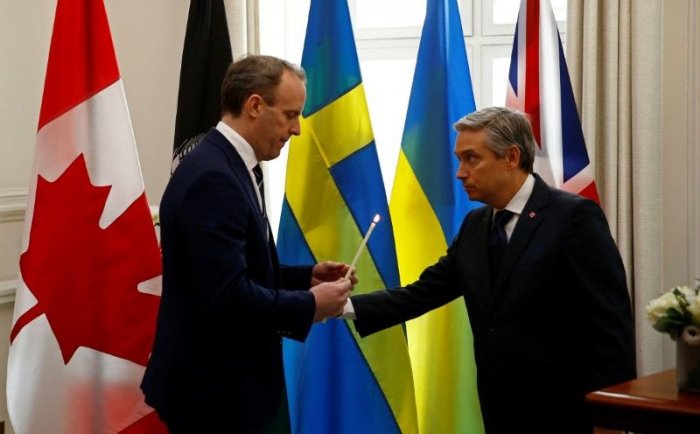 Canadian, UK ministers pay respects to victims of plane downed by Iran