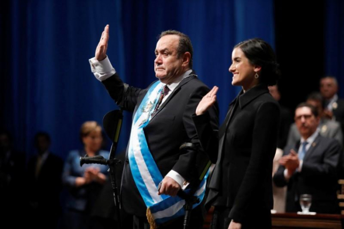Guatemalan president takes office amid political jostling and delays