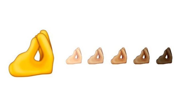 The many meanings of the pinched fingers emoji