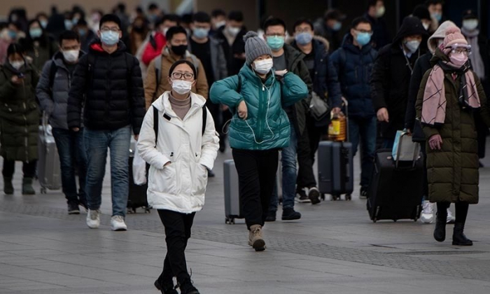 China virus death toll tops 1,100 as new cases fall  