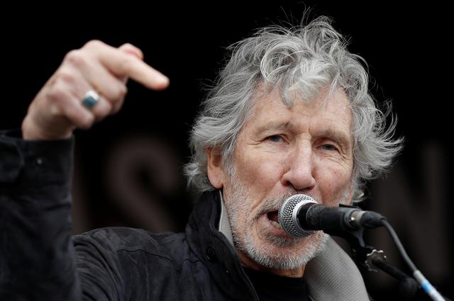 Roger Waters of Pink Floyd joins Assange supporters in London protest march