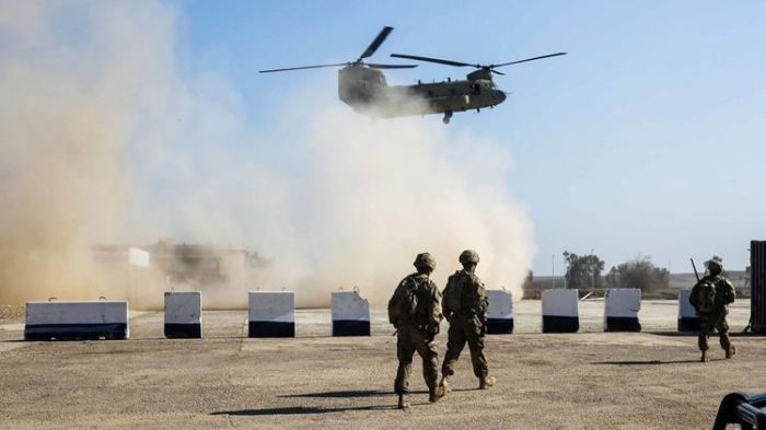 US-led coalition closing several bases in Iraq following rocket attacks