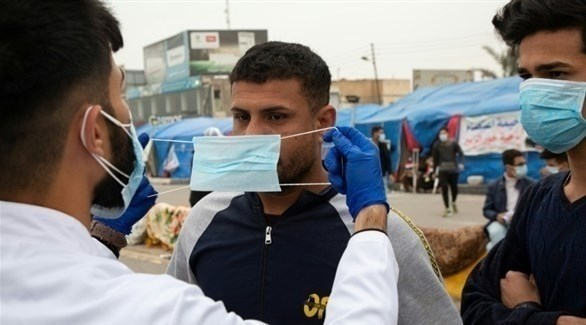 المتظاهرون في العراق لا يخشون كورونا... "الفيروس الحقيقي هم الساسة"