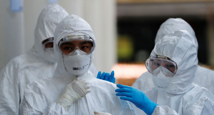 خبراء يقيمون الوضع في العالم بعد إعلان فيروس كورونا وباء عالميا