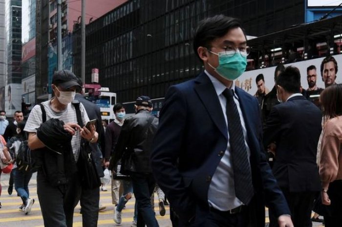 Beijing to quarantine travelers from South Korea, Japan, Iran and Italy