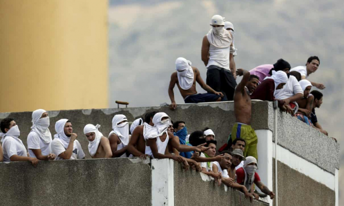 Riot in Venezuela prison kills at least 40 and injures 50, including warden