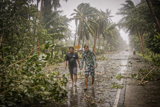 Typhoon forces 140,000 from homes in virus-hit Philippines
 