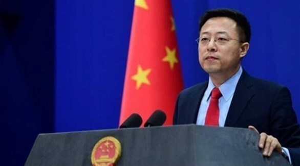 الصين: الاتهامات الأمريكية باختراق أبحاث عن كورونا "افتراءات"