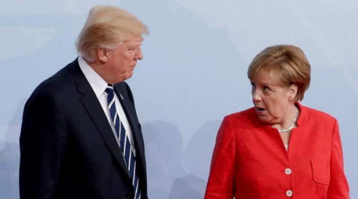  Merkel Trampın dəvətindən imtina etdi 