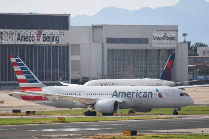 China to allow limited US passenger flights
 