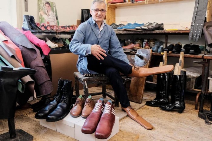 Romanian shoemaker creates size 75 shoes for social distancing