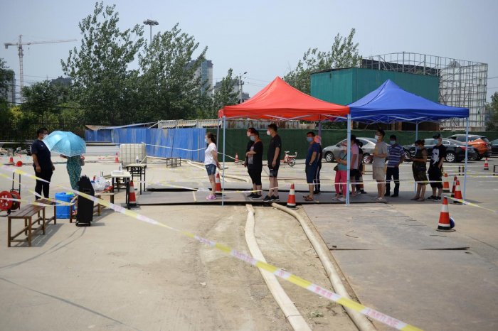 China reports 18 new coronavirus cases, nine in Beijing