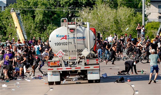 Large truck drives through crowd of protesters in Minneapolis